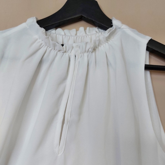 Naked Zebra sleeveless blouse with ruffle neckline details - Picture 4 of 7